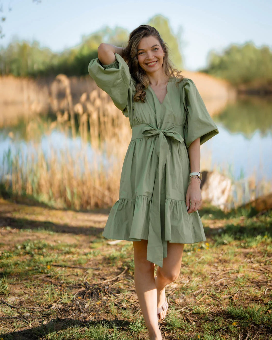 Green dress TROPICANA with a bow